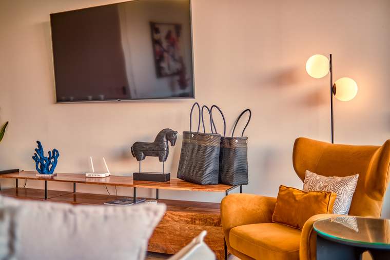 Media wall and lounge chair