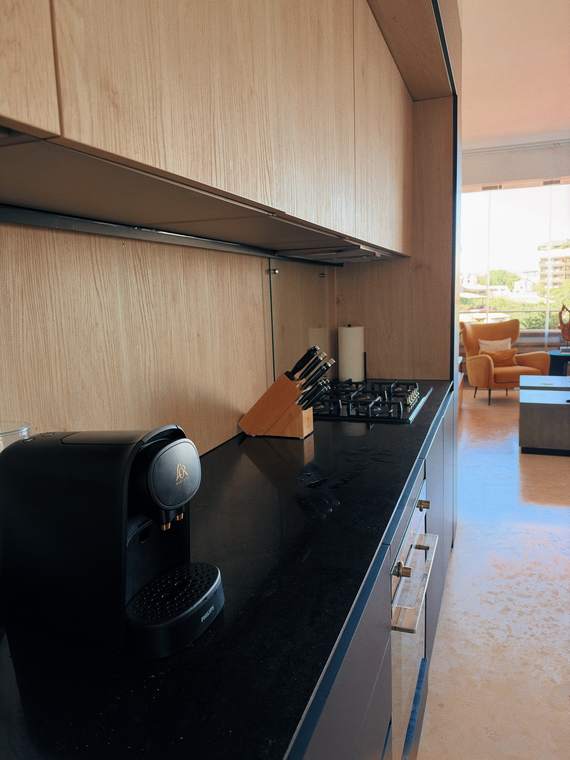Kitchen counter with views of the living room
